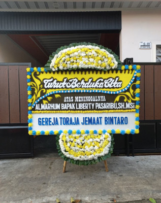 Papan Bunga Duka di Manado Tua Satu
